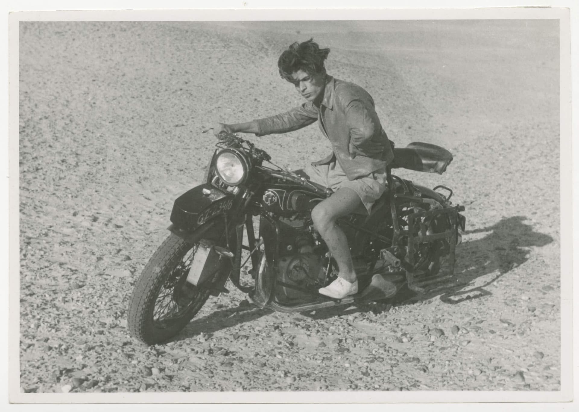 Tough guy posing on Arthur Staal's motorcycle during his tour through the British protectorate Palestine in 1939. Collection Het Nieuwe Instituut, STAA f205 