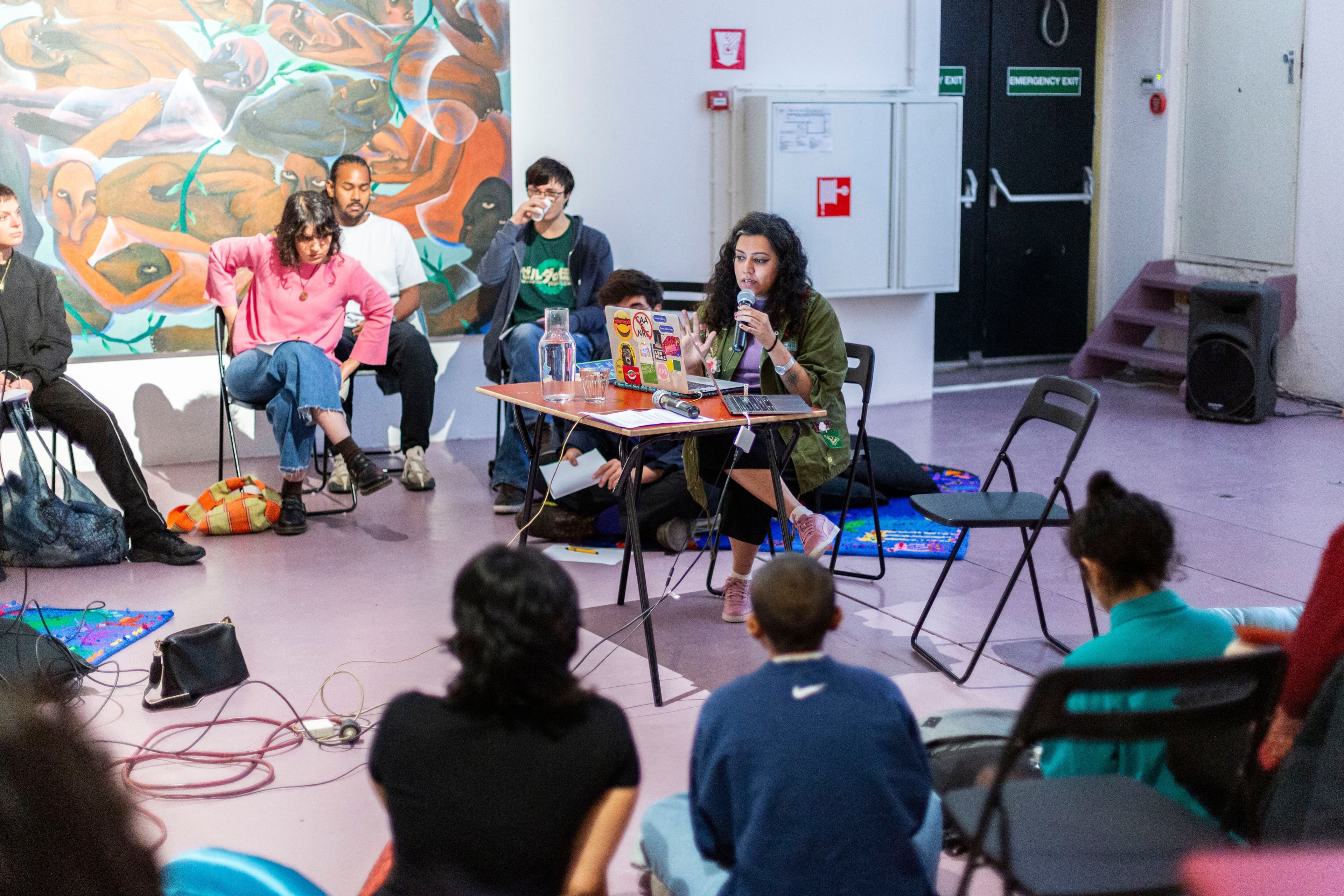 Meenakshi Thirukode giving a presentation at W139. Photo: Elodie Vreeburg.