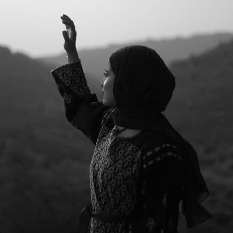 Black and white portrait photo of Tala Abdalhadi