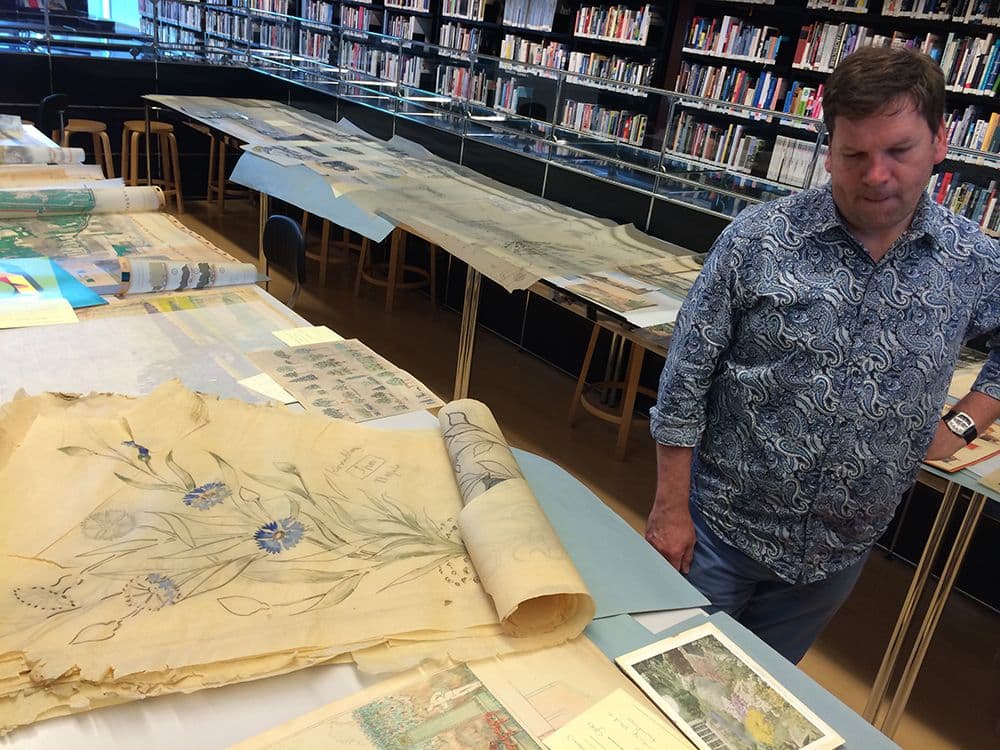  Archivist and curator Alfred Marks is selecting material from the collection.  