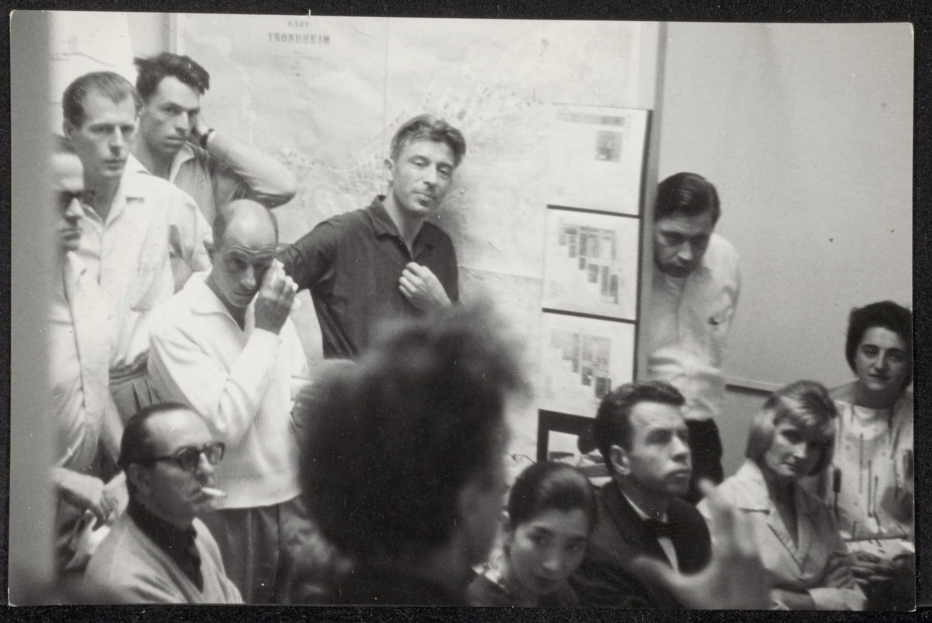 A black and white photograph of a gathering during CIAM with Aldo van Eyck. Photo: Joachim Pfeufer