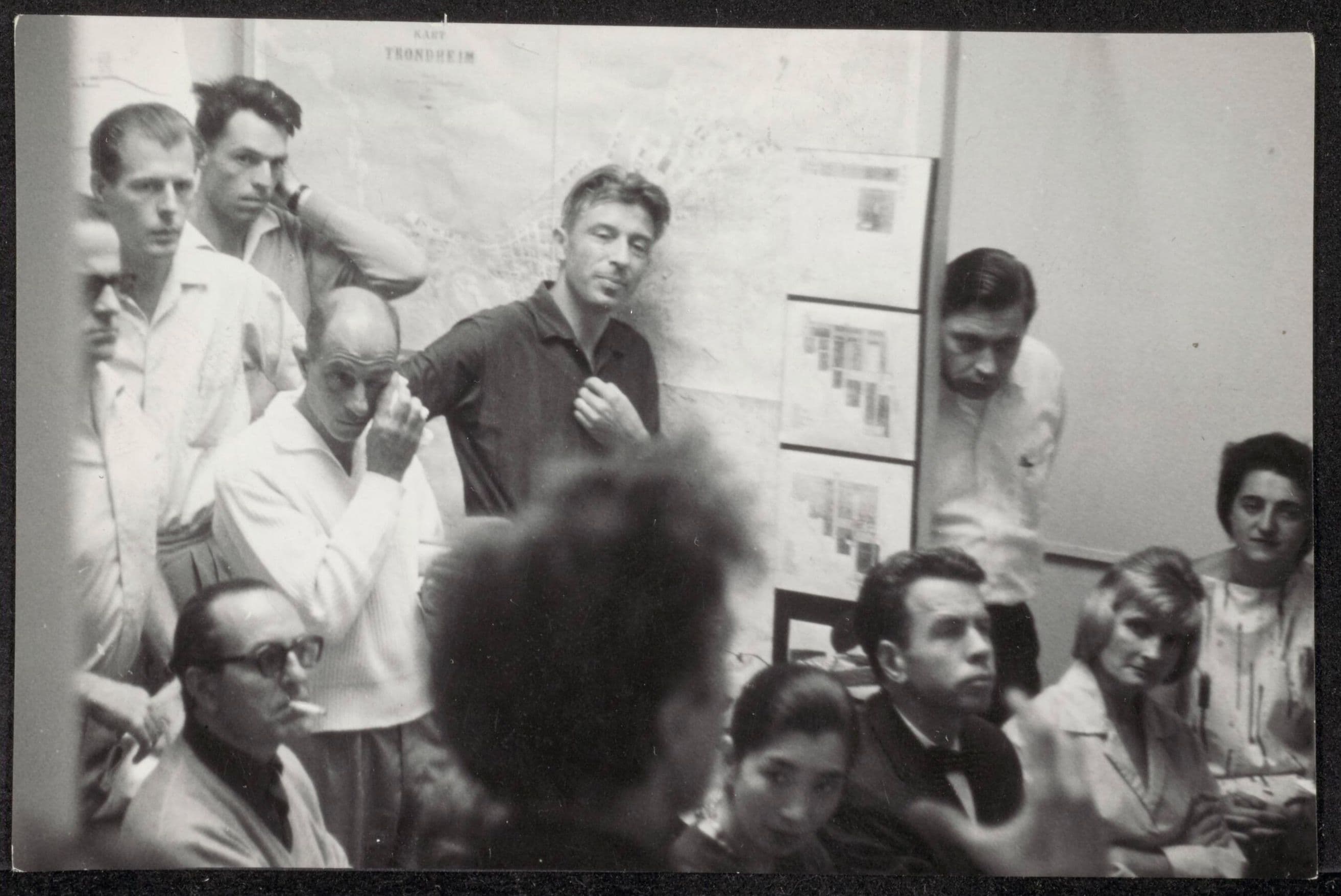 A black and white photograph of a gathering during CIAM with Aldo van Eyck. Photo: Joachim Pfeufer