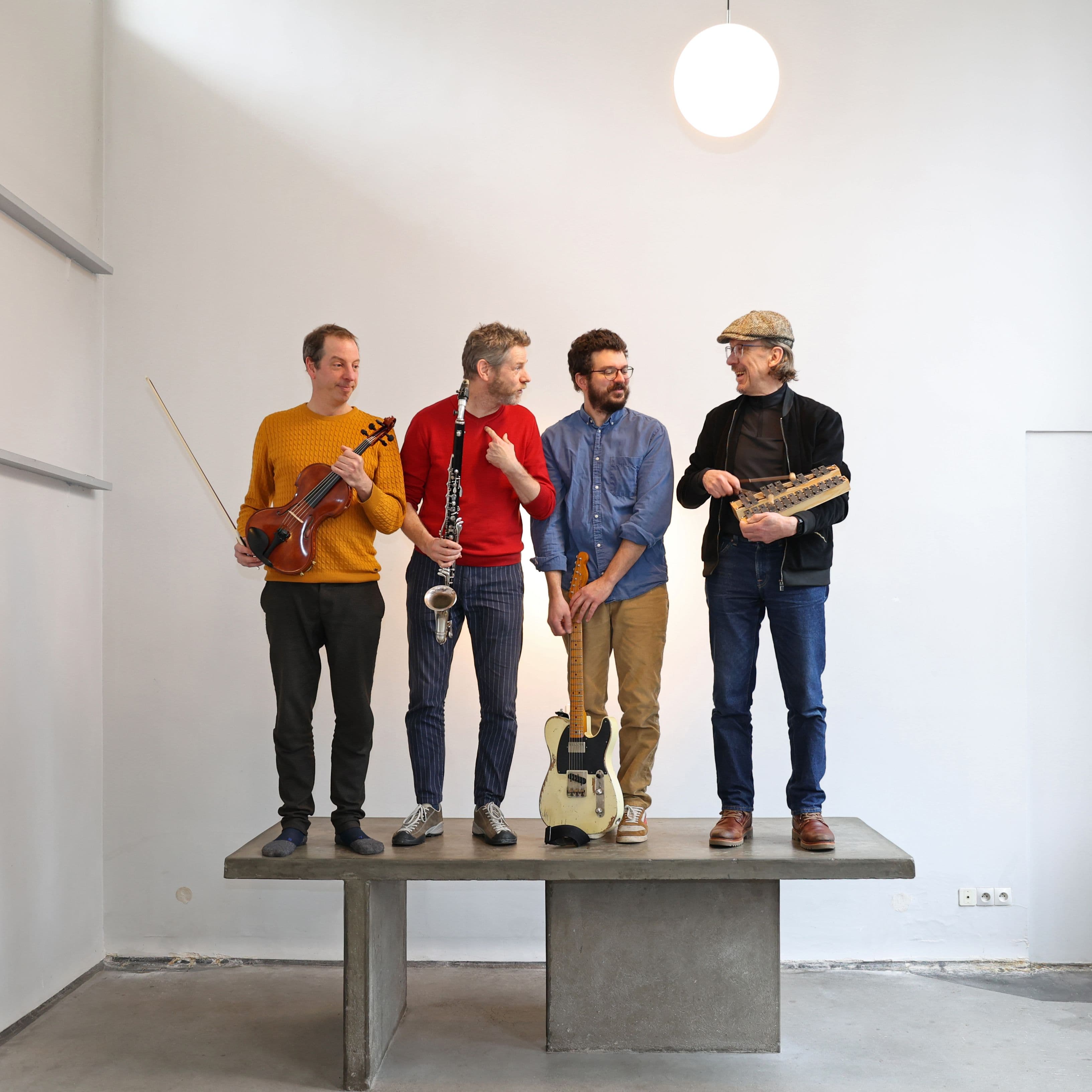 Steven Kamperman and musicians on a concrete table designed by Theo van Doesburg. Photo: Jean-Michel Bale.