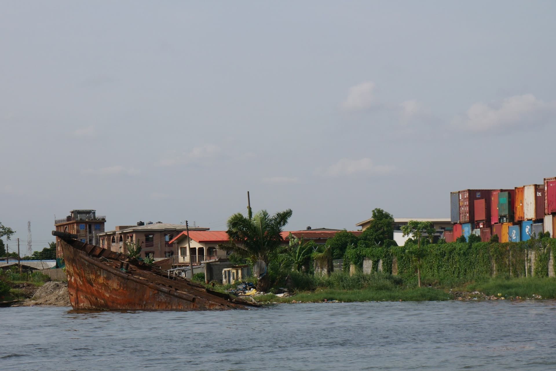 Shipwreck and shipping containers, Apapa Lagos. Photo by Dele Adeyemo.