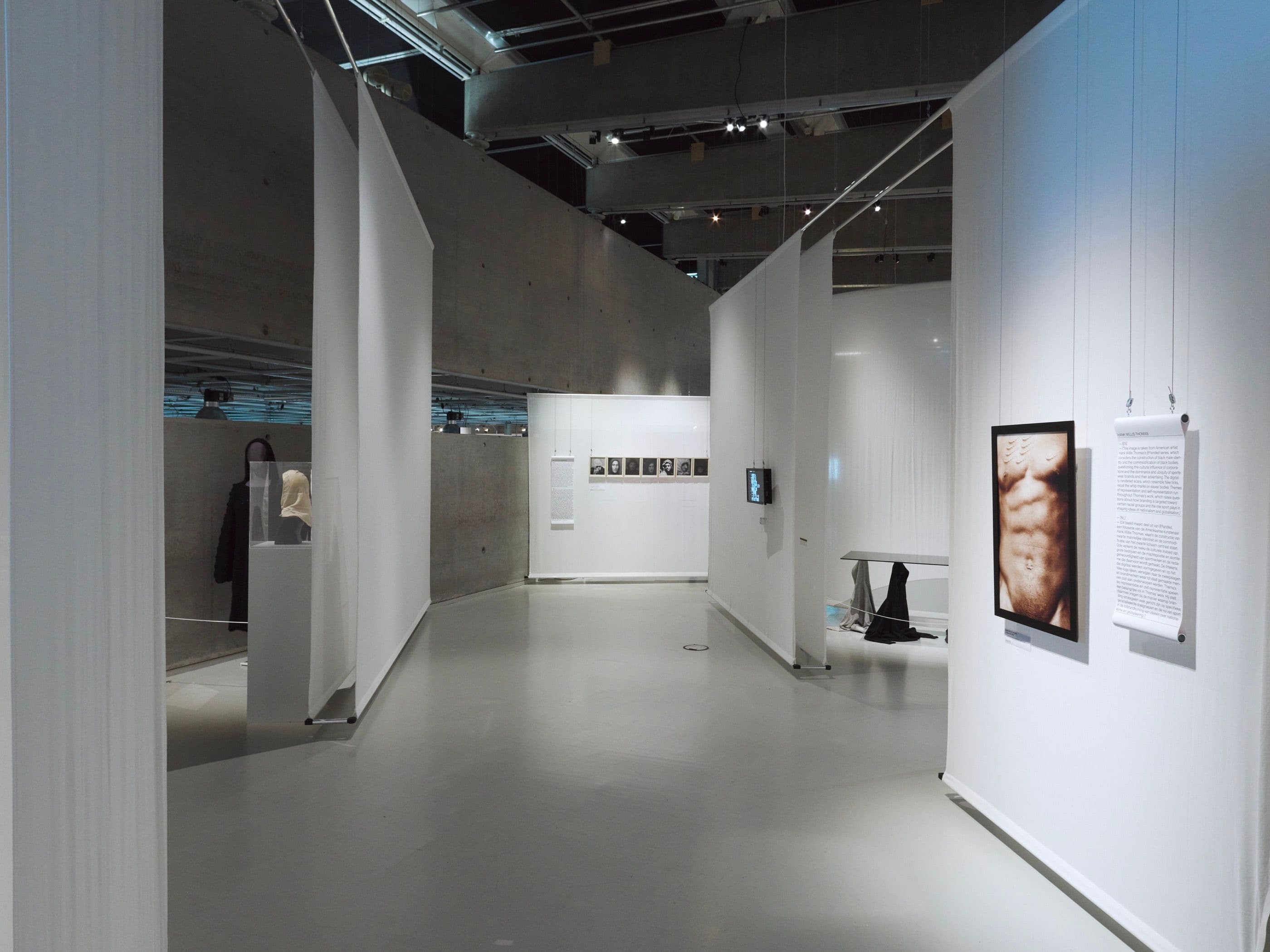 Installation overview of ‘The Hoodie’ (Het Nieuwe Instituut, 01/12/2019 – 12/04/2020), featuring Hank Willis Thomas’ work ‘Scarred Chest’, 2003. Courtesy of the artist and Jack Shainman Gallery, New York. Photo: Johannes Schwartz. 