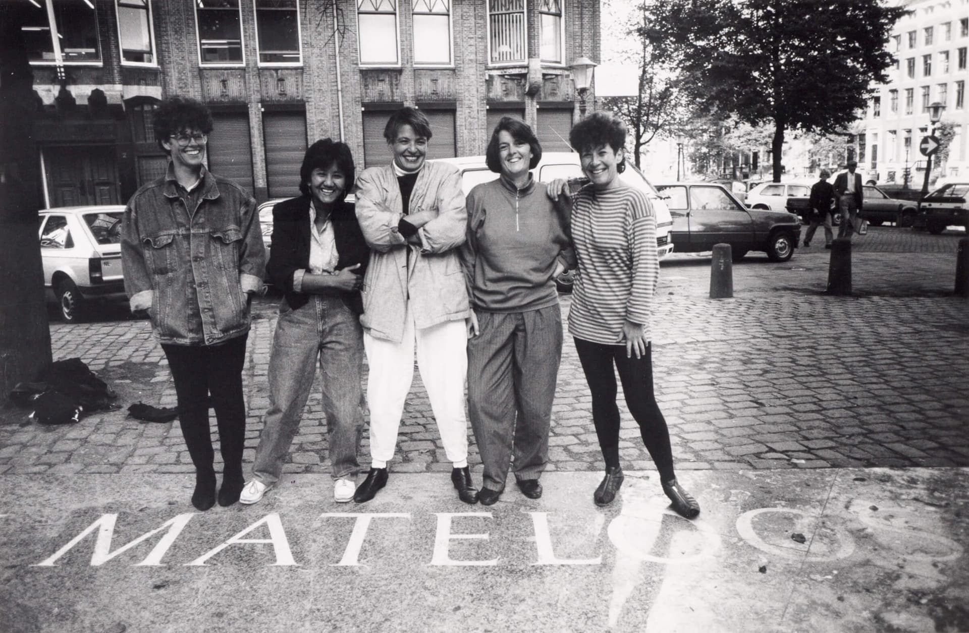 Members of Mama Cash, the pioneering independent feminist fund, posing in front of the Homomonument [Gay Monument] in Amsterdam, from left to right: Dorelies Kraakman, Tjheng Hwa Tjoa, Patti Slegers, Lida van den Broek, Marjan Sax; missing… 