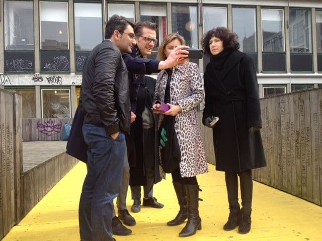 Savvas Ciriacidis (left), Kate Goodwin (partly visible right of the middle) and Tina di Carlo (far right) on Rotterdam's Luchtsingel with Kristian Koreman from ZUS. 