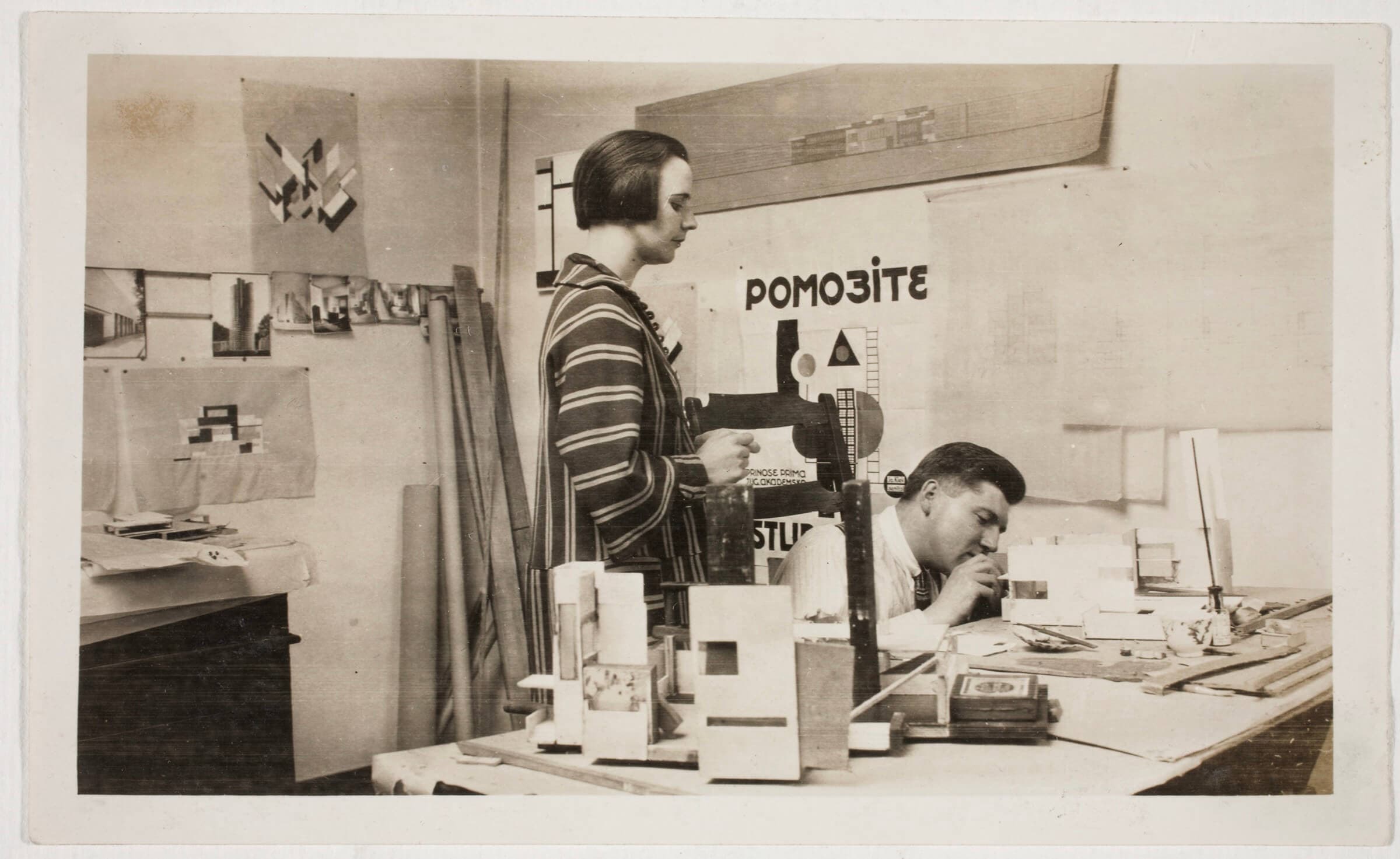 Nelly van Doesburg and Cornelis van Eesteren, working on a model, in the studio in the Rue du Moulin Vert, Paris, 1923. RKD - Nederlands Instituut voor Kunstgeschiedenis, Den Haag, Archive of Theo and Nelly van Doesburg (0408), inv.nr. 1572 