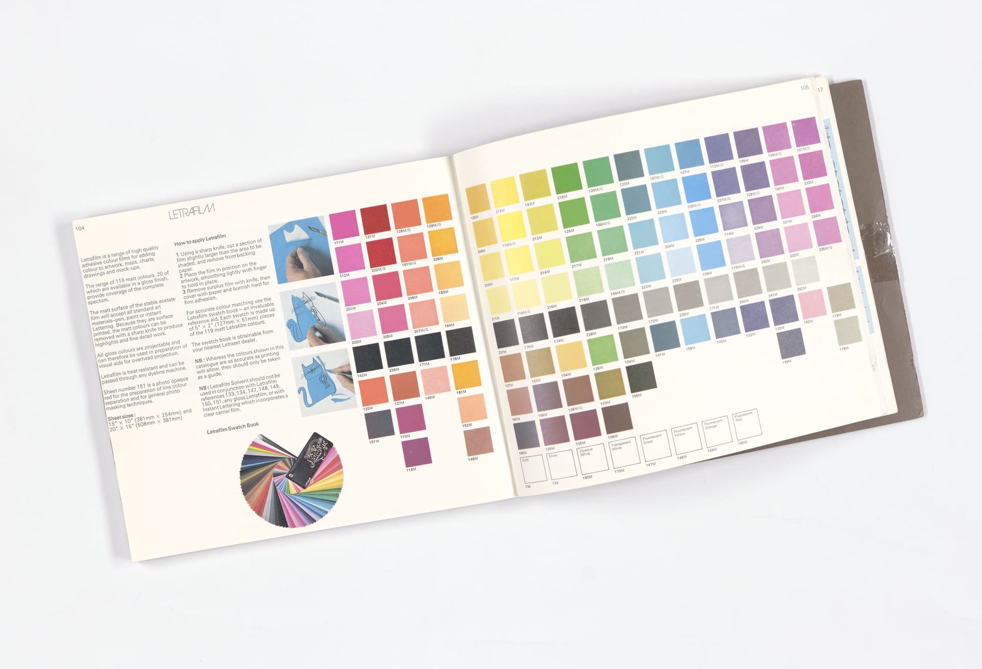 A range of matte and glossy colour adhesive films in a Letraset catalogue. The films were heat resistant, making them suitable for diazotype reproduction and, therefore, appealing to architects. On the left are instructions for applying th… 