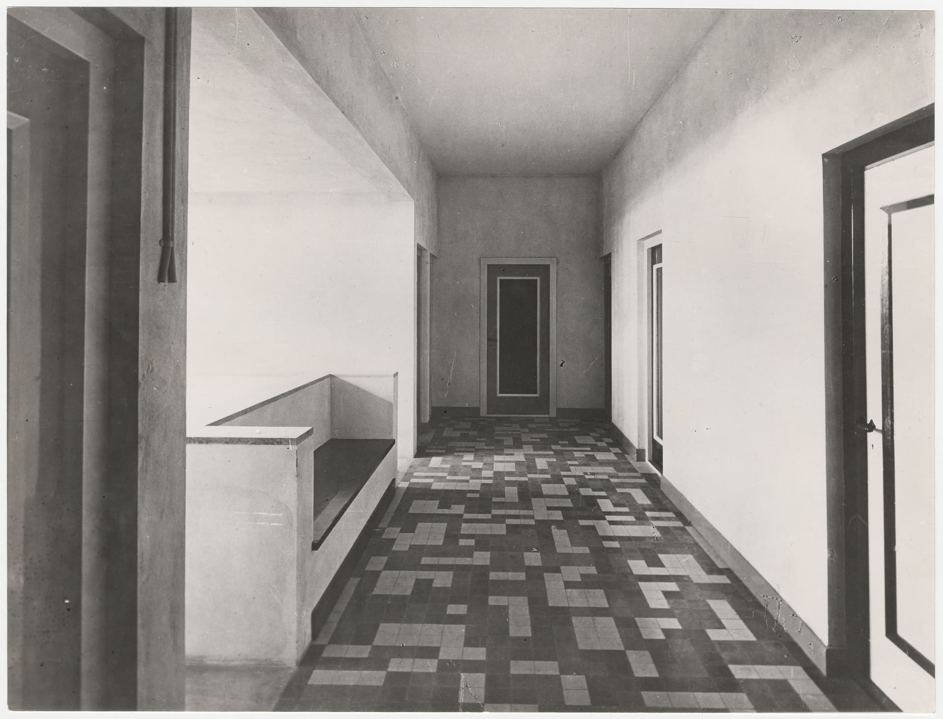 J.J.P. Oud and Th. van Doesburg (tile floors). Huis De Vonk in Noordwijkerhout 1917. Holiday home for factory girls with an interior of smooth walls and hygienic, tiled floors. The floor design with black, white and yellow-ochre tiles is b… 