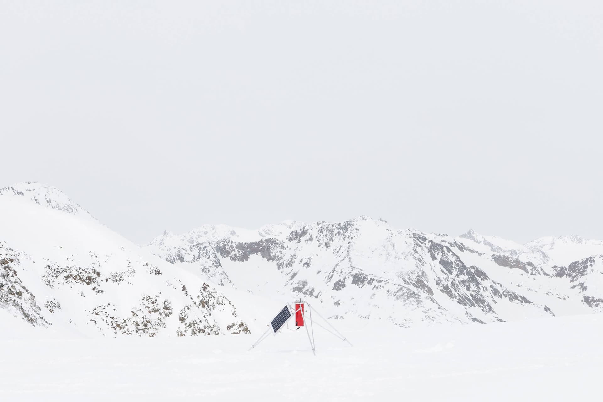 A border measurement device installed on the Austrian-Italian drainage divide, Gräfferner glacier, Ötztal Alps, April 2016. Photo by Delfino Sisto Legnani, courtesy Studio Folder.  