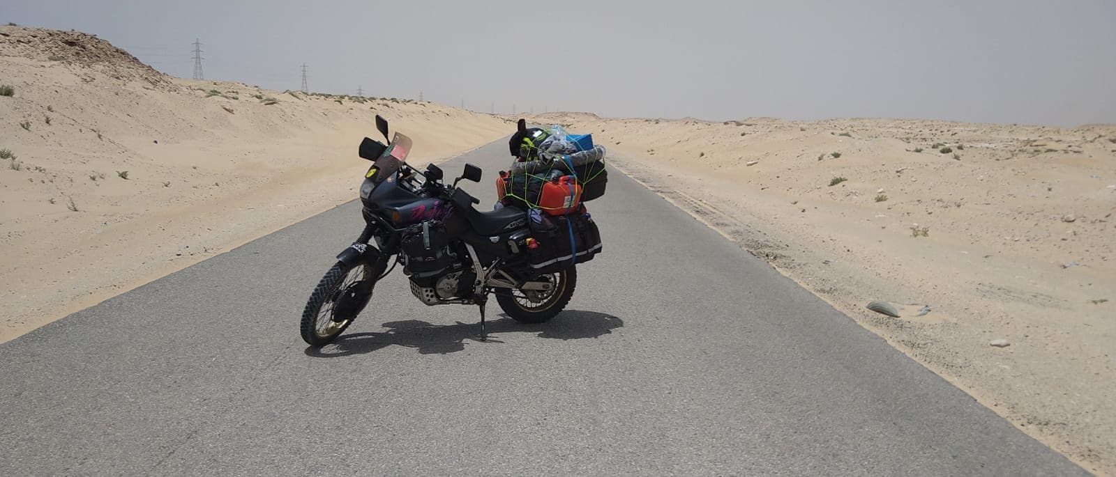 Motorbike parked on a road. Photo: Samba Soumbounou