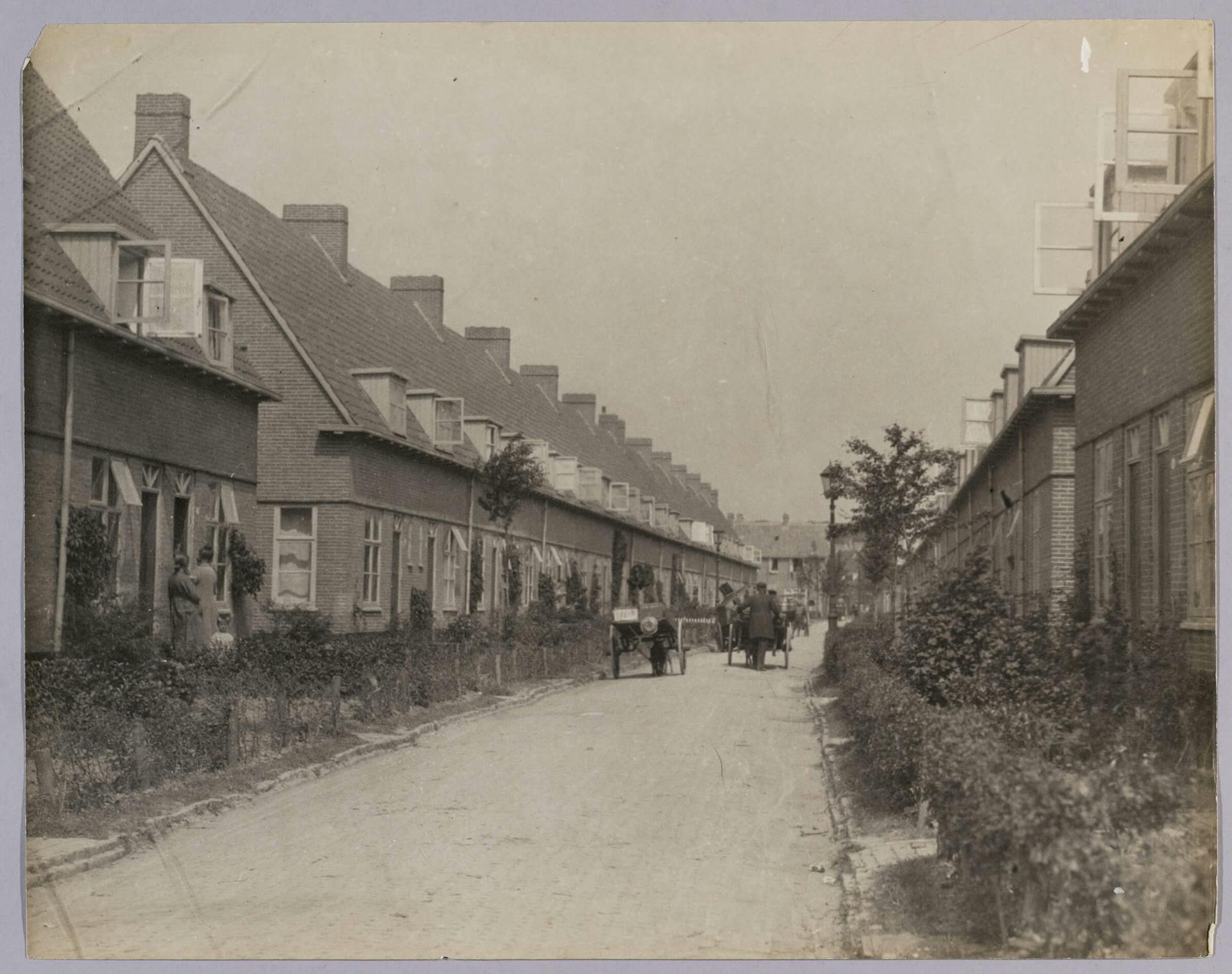 Residential street with front gardens and young trees in the garden suburb of Vreewijk, after a design by Granpré Molière, Verhagen and Kok, c. 1925. Photographer unknown. Collection: Het Nieuwe Instituut, photo collection of the Tentoonstellin… 