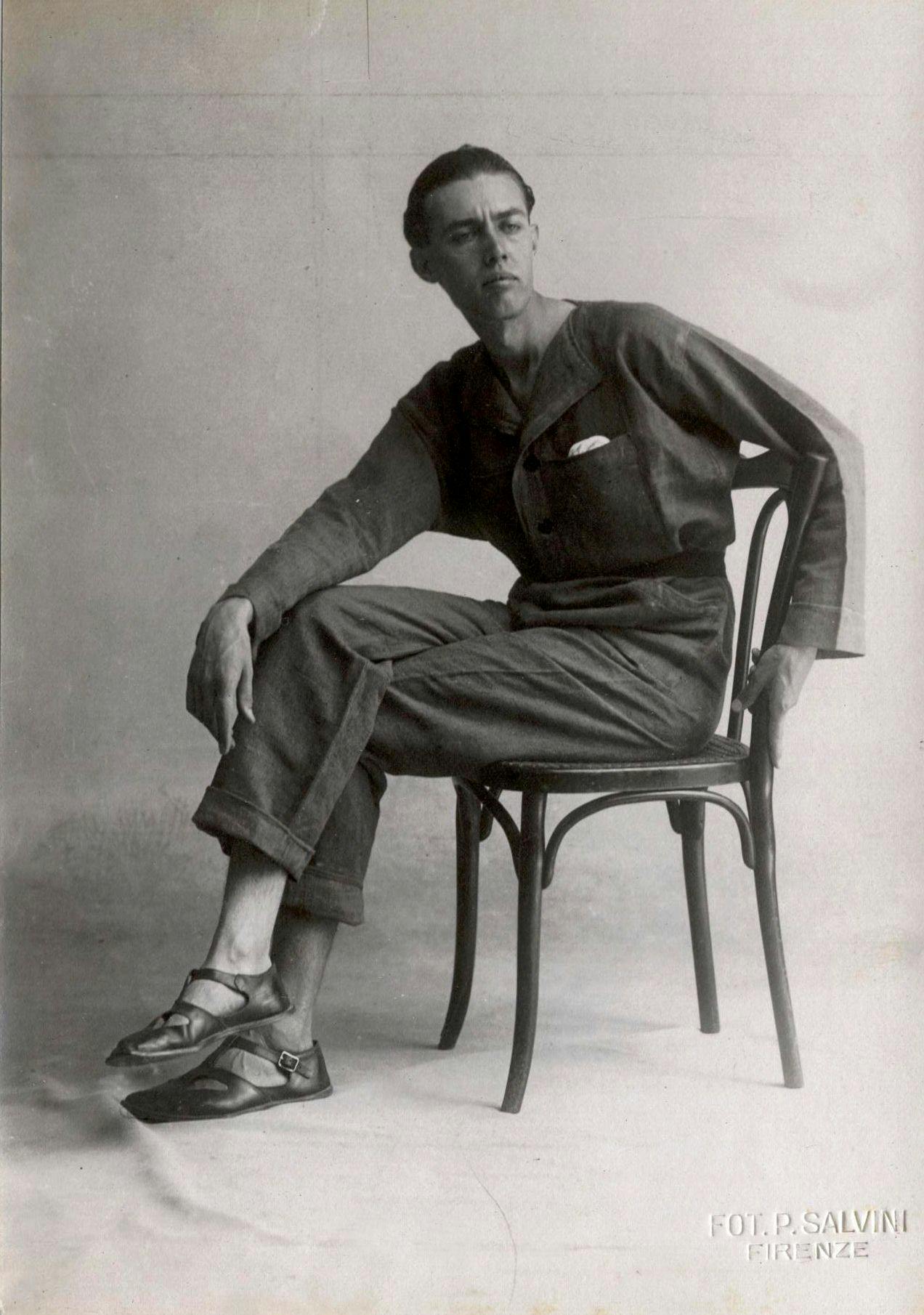 Seated Thayaht wearing overalls Photographer P. Salvini, Florence, 1920 Photographic archive of the PratoTextile Museum