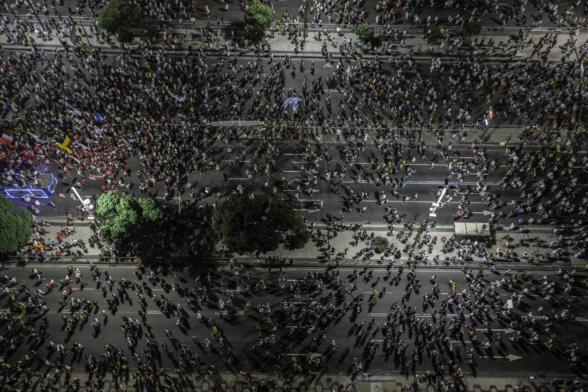 Brazilians attend a protest against corruption. Photo EPA/Oliver Weiken 
