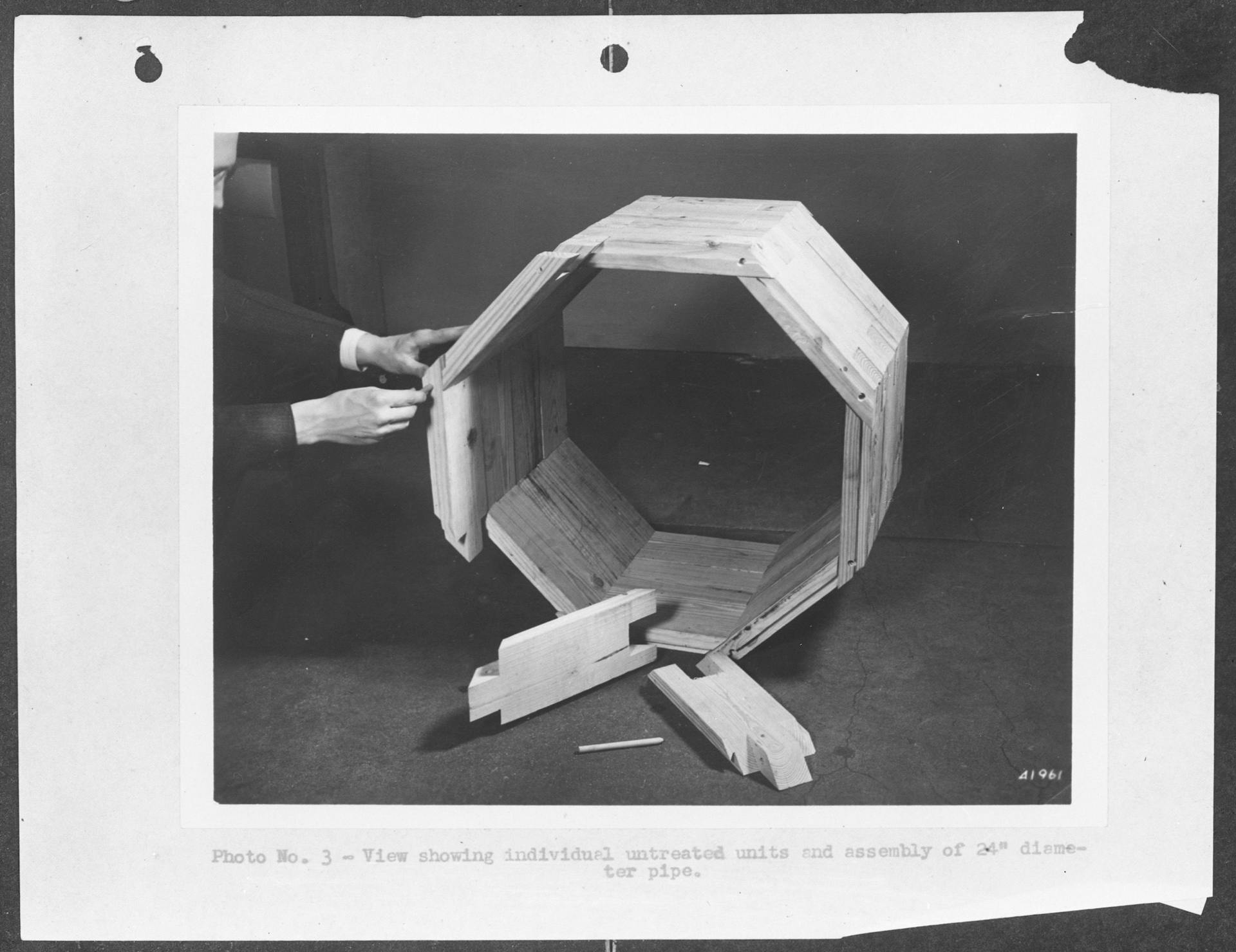 Substitute materials. Wood culverts for steel. Assembly of an emergency sectional wood pipe, twenty-four inches in diameter. These pipes, used in place of corrugated iron or reinforced concrete pipes, are made of sections cut from short lengths… 